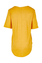 Product shot of the Ariana Tee in colour Mustard, from the back