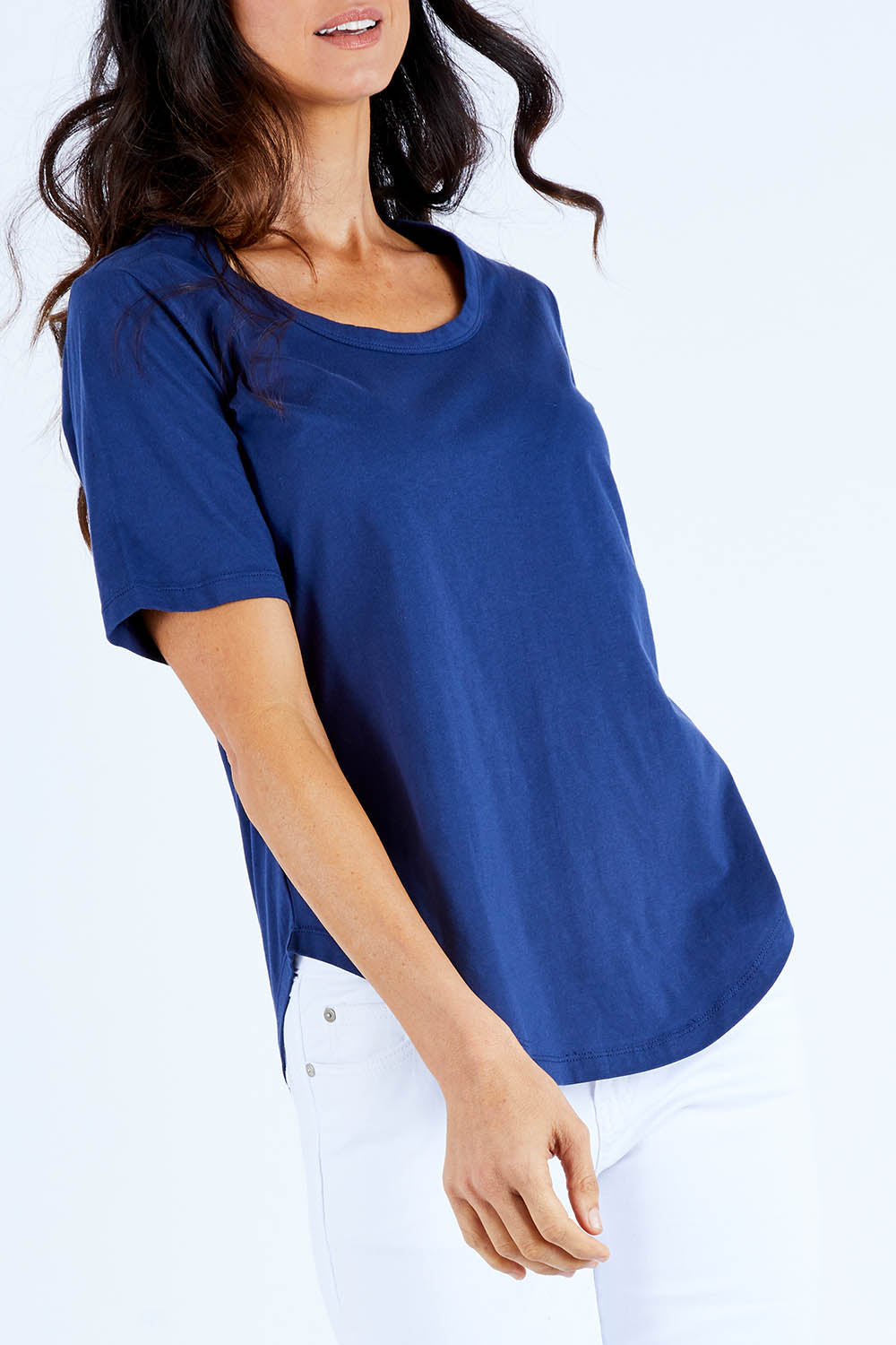 Model Gemma wearing size 10 of the Ariana Tee in colour Navy (Blue), from the front, cropped image
