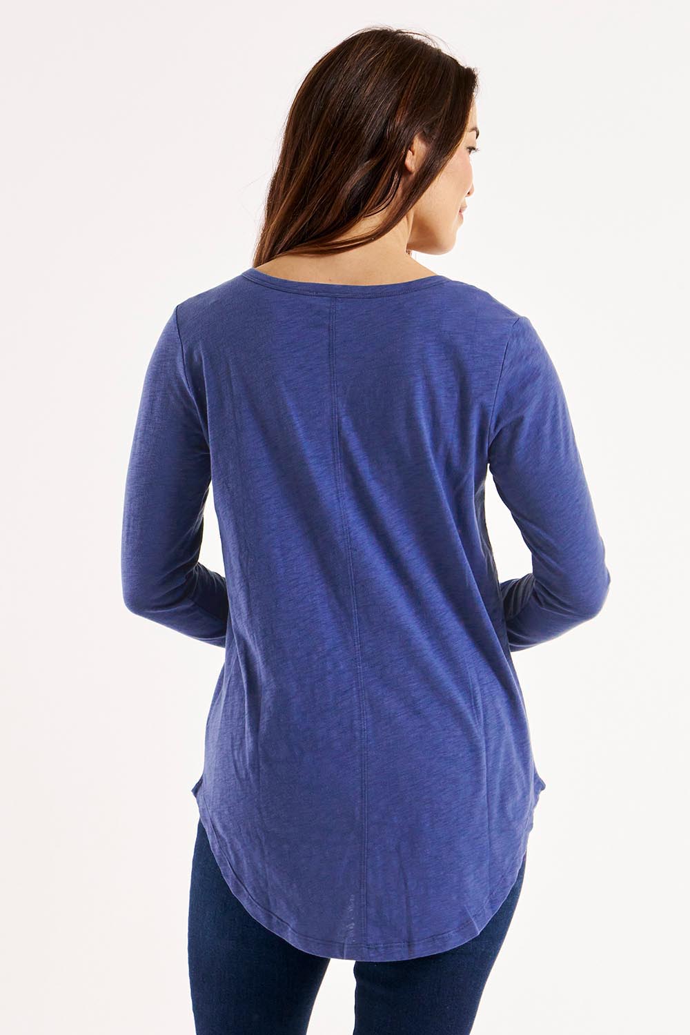 A model wearing the Megan Long Sleeve Cotton Top in colour Oceanblue (Blue), from the back