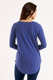 A model wearing the Megan Long Sleeve Cotton Top in colour Oceanblue (Blue), from the back