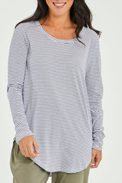Model Katie wearing size 10 of the Megan Long Sleeve Top in colour Indistripe (Blue), from the front, cropped image