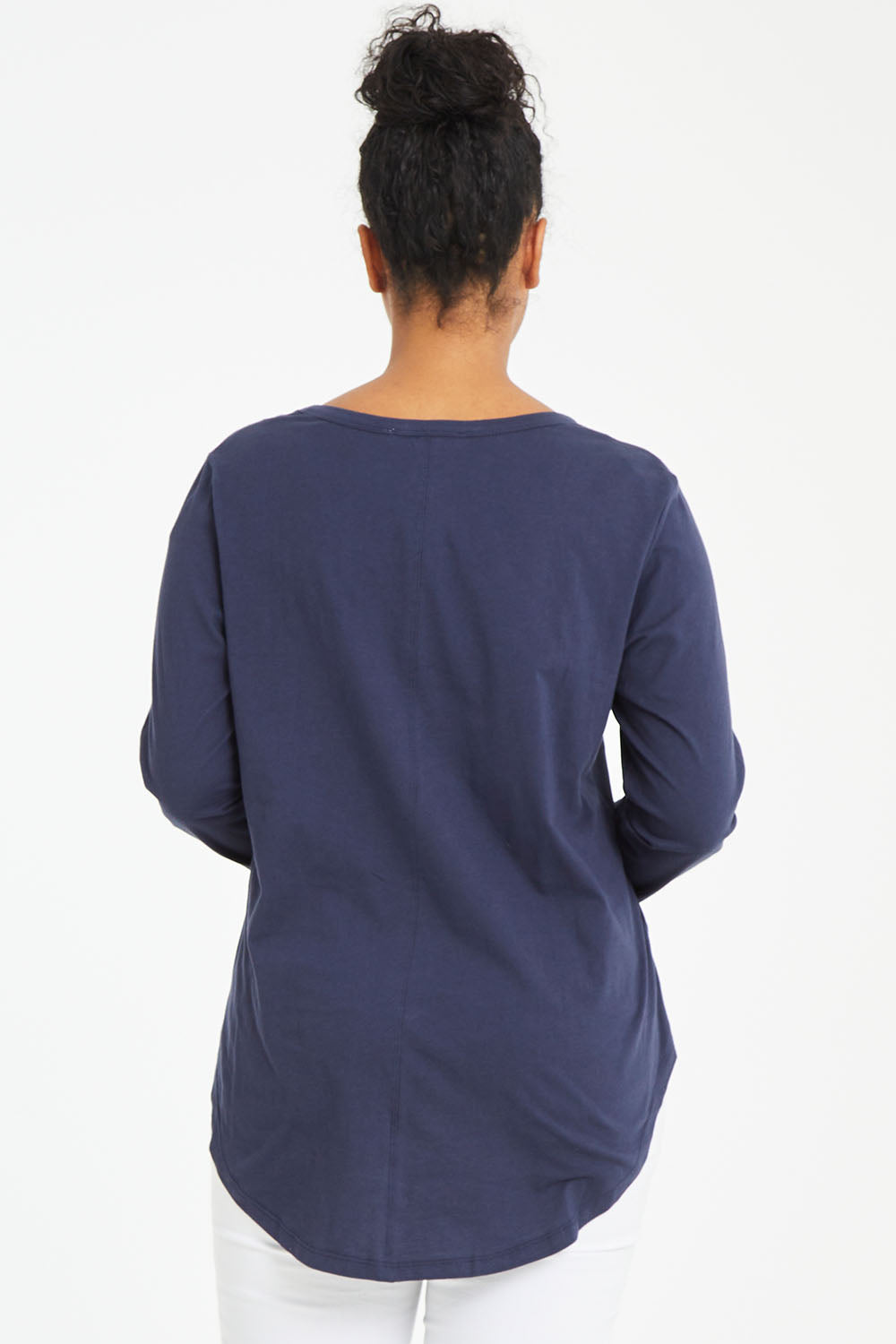Model Noli wearing size 14 of the Megan Long Sleeve Top in colour Newnavy (Blue), from the back