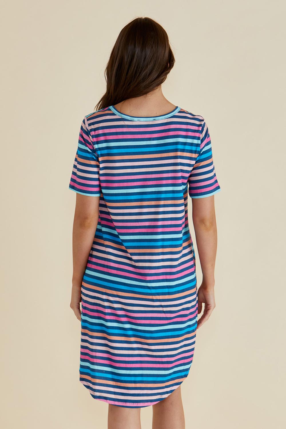 A model wearing the Nyree Cotton Dress in colour Multi, from the back