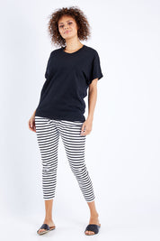 Model Lala wearing size 10 of the Boxy Tee in colour Black (Black), from the front, showing the whole outfit