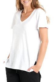A model wearing the Billie Tee in colour White (White), from the front, cropped image