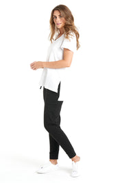 A model wearing the Billie Tee in colour White (White), from the front, showing the whole outfit