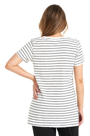 A model wearing the Billie Tee in colour Whiteblack (White), from the back