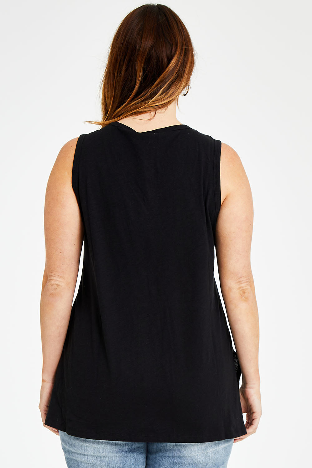 Model Laura wearing size 14 of the Audrey Tank in colour Black (Black), from the back