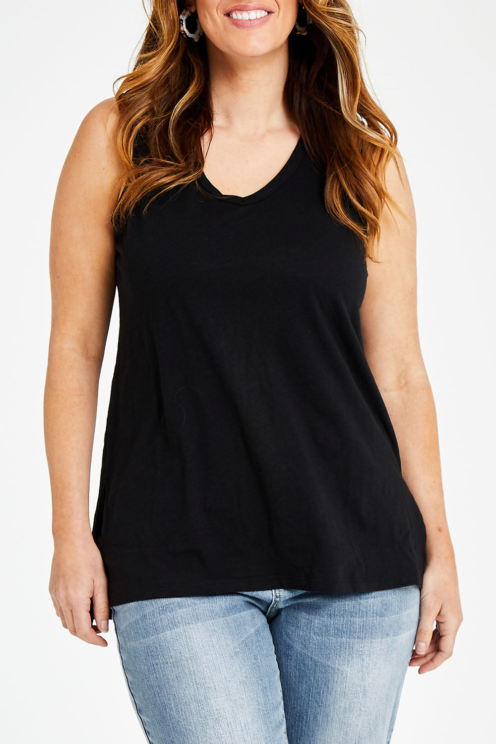 Model Laura wearing size 14 of the Audrey Tank in colour Black (Black), from the front, cropped image