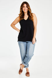 Model Laura wearing size 14 of the Audrey Tank in colour Black (Black), from the front, showing the whole outfit
