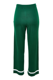 Product shot of the Delphine Knit Pant in colour Basil (Green), from the back