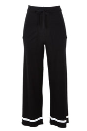 Product shot of the Delphine Knit Pant in colour Black (Black), from the front