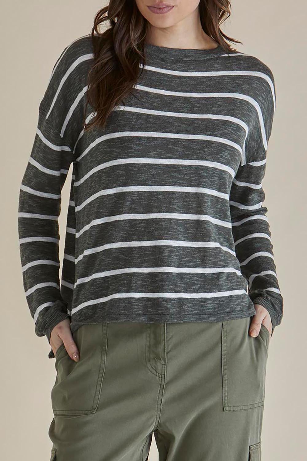 A model wearing the Natasha Cotton Blend Knit Top in colour Green (Green), from the front, cropped image