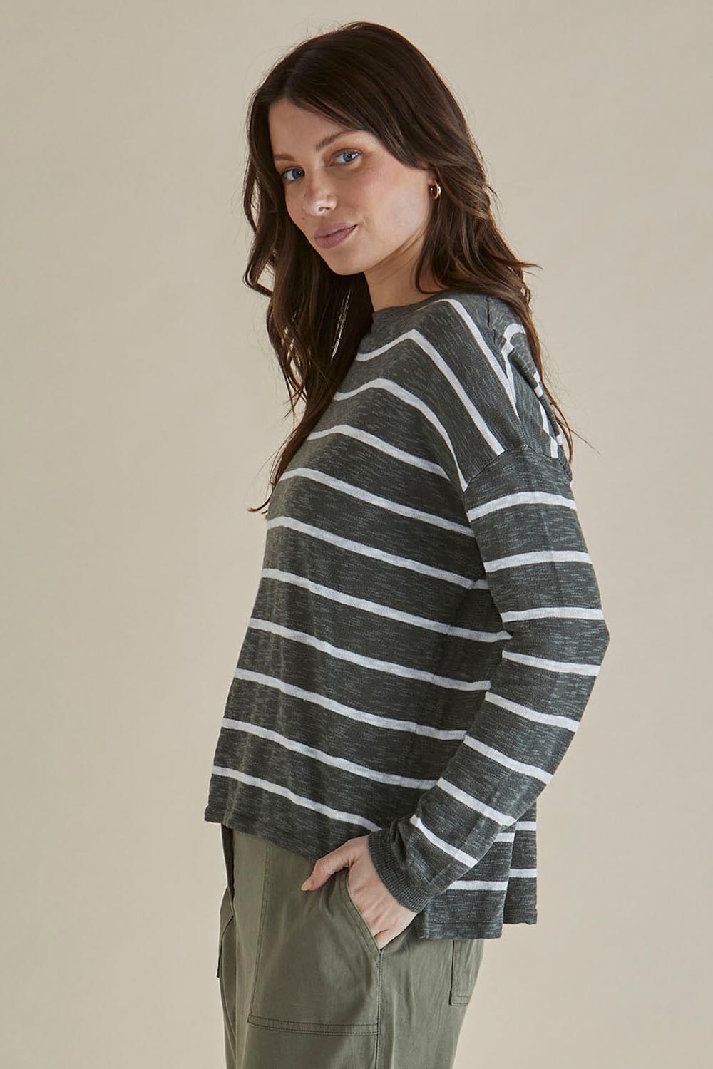 A model wearing the Natasha Cotton Blend Knit Top in colour Green (Green), from the front, cropped image