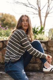 A model wearing the Natasha Cotton Blend Knit Top in colour Green (Green), from the front, showing the whole outfit
