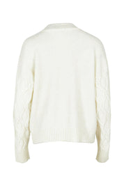 Product shot of the Celene Knit Cardigan in colour Cream, from the back