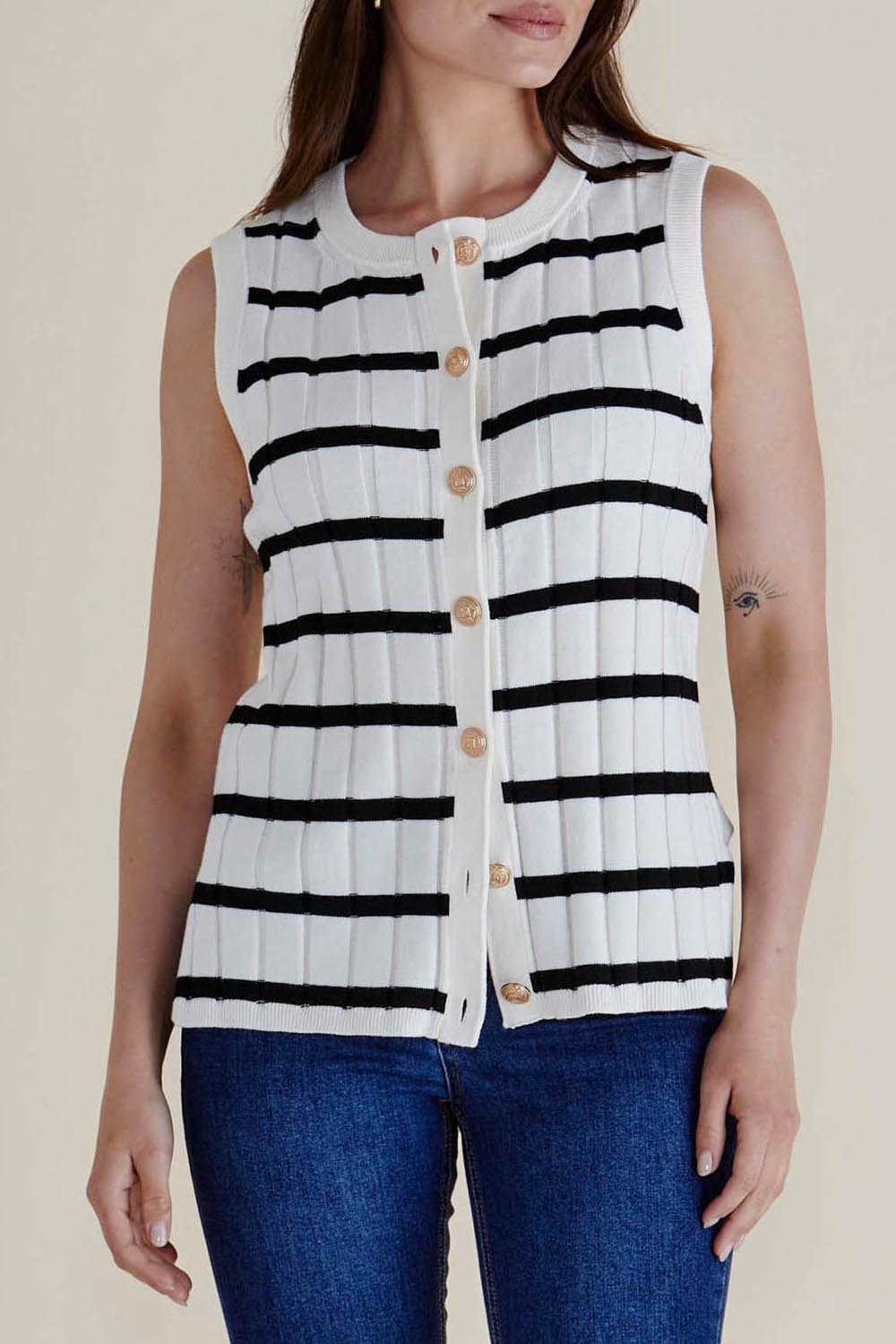 A model wearing the Nicollete Cotton Knit Vest in colour Blkstripe (White), from the front, cropped image