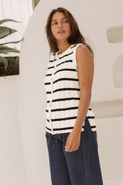 A model wearing the Nicollete Cotton Knit Vest in colour Blkstripe (White), from the front, showing the whole outfit