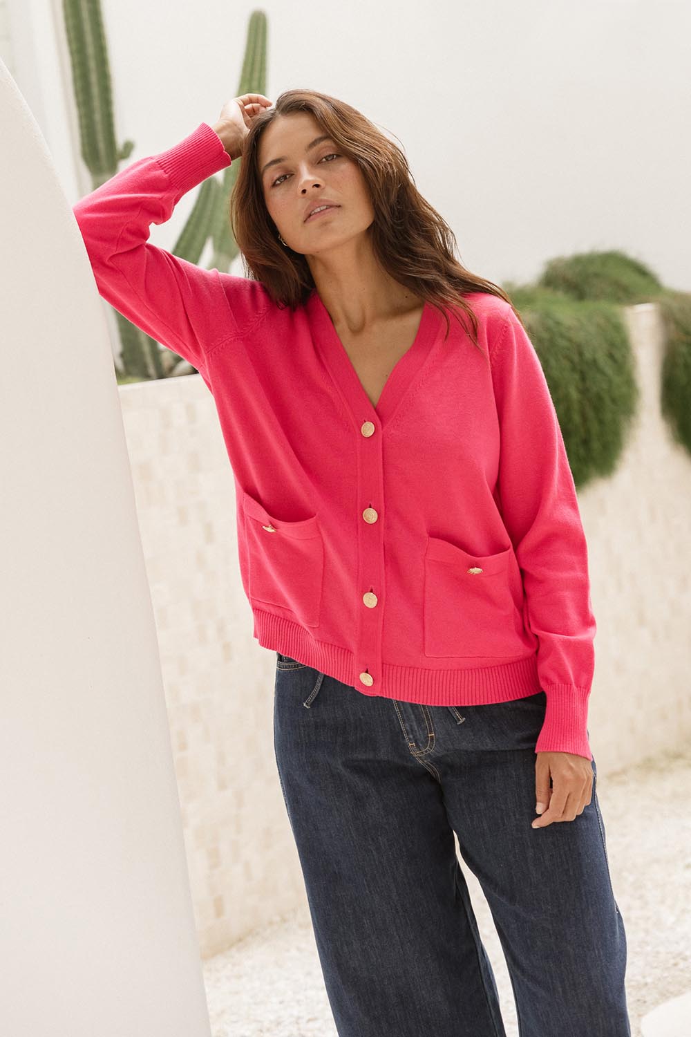 A model wearing the Leon Cotton Blend Knit Cardigan in colour Pink (Pink), from the front, showing the whole outfit