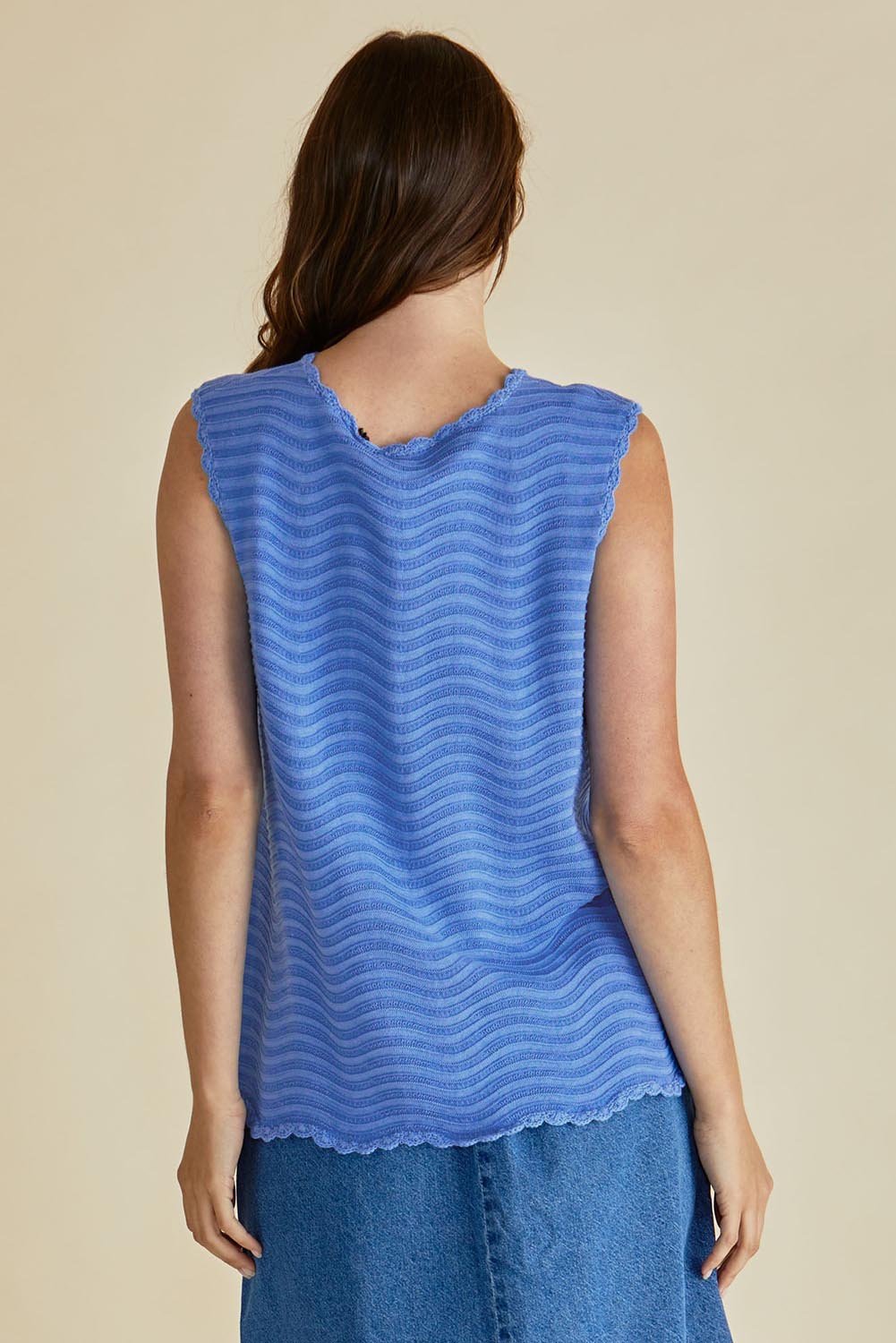 A model wearing the Aviva Cotton Tank in colour Blue (Blue), from the back