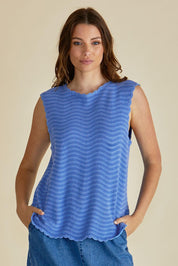 A model wearing the Aviva Cotton Tank in colour Blue (Blue), from the front, cropped image