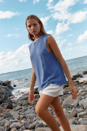 A model wearing the Aviva Cotton Tank in colour Blue (Blue), from the front, showing the whole outfit