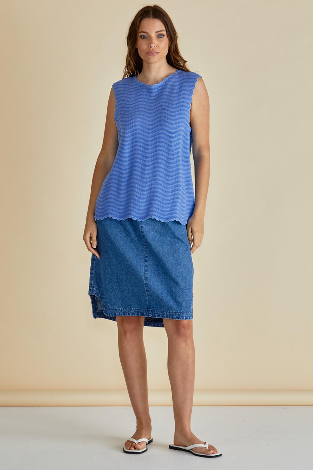A model wearing the Aviva Cotton Tank in colour Blue (Blue), from the front, showing the whole outfit