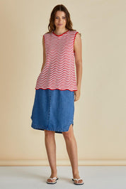 A model wearing the Aviva Cotton Tank in colour Redwhite (Red), from the front, showing the whole outfit