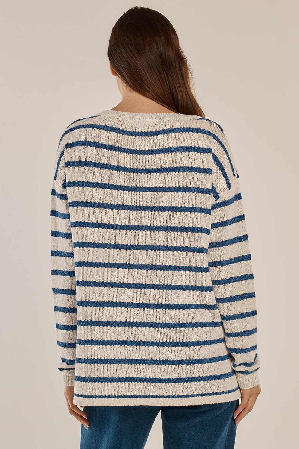 A model wearing the Bradford Knit Top in colour Nautical (Blue), from the back
