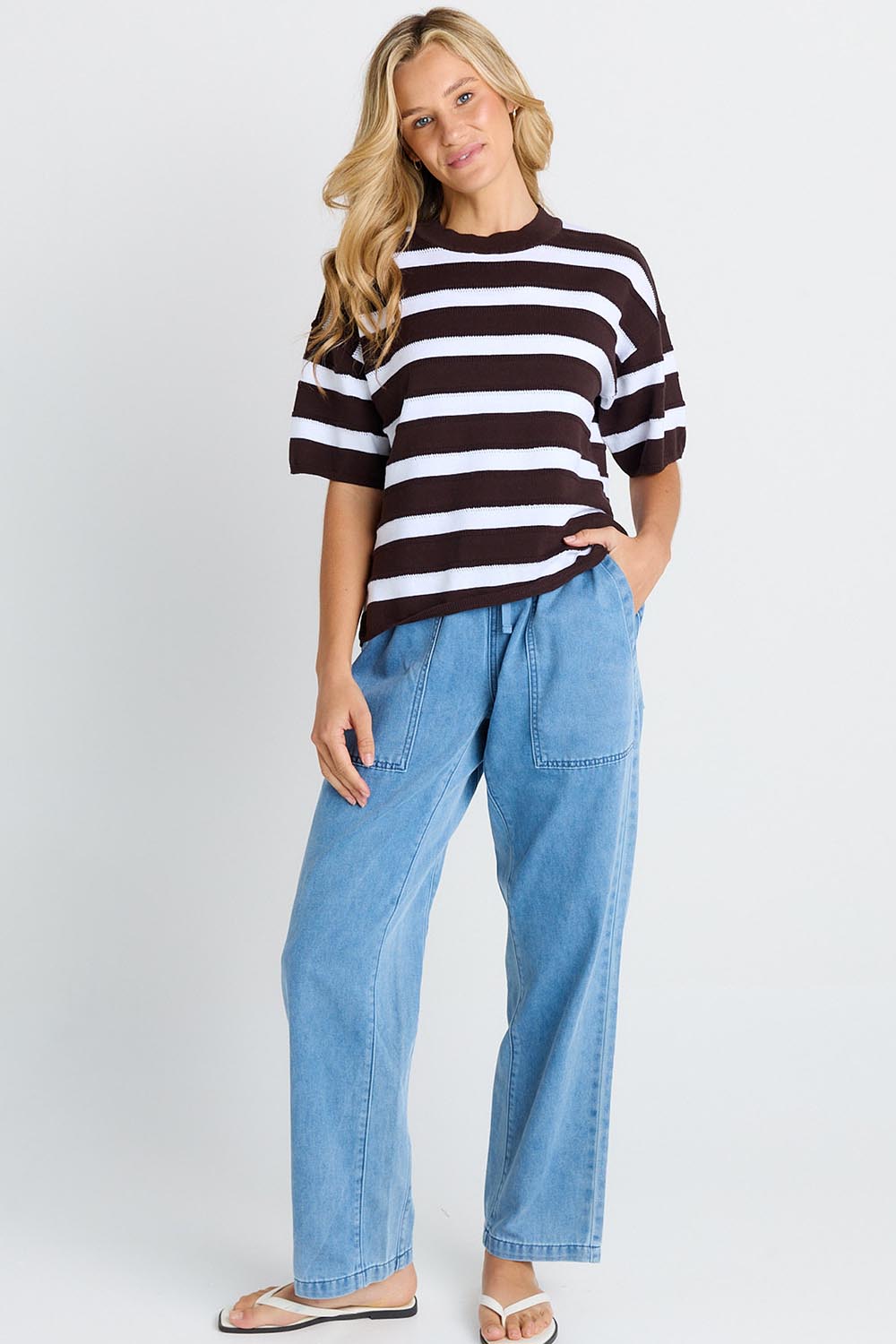 Model Genericm wearing size sample of the Libby Boxy Top – Chocolate in colour Chocolate, from the front