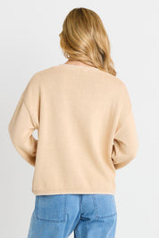 Model Genericm wearing size sample of the Ascot Stitch Sweater – Cream in colour Cream, from the back