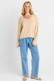 Model Genericm wearing size sample of the Ascot Stitch Sweater – Cream in colour Cream, from the front