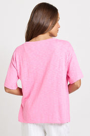 Model Genericm wearing size sample of the Aries V-Neck Sweater Tee – Pink in colour Pink, from the back