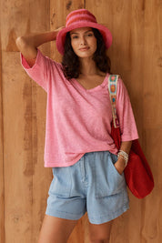 Model Genericm wearing size sample of the Aries V-Neck Sweater Tee – Pink in colour Pink, in a cropped view