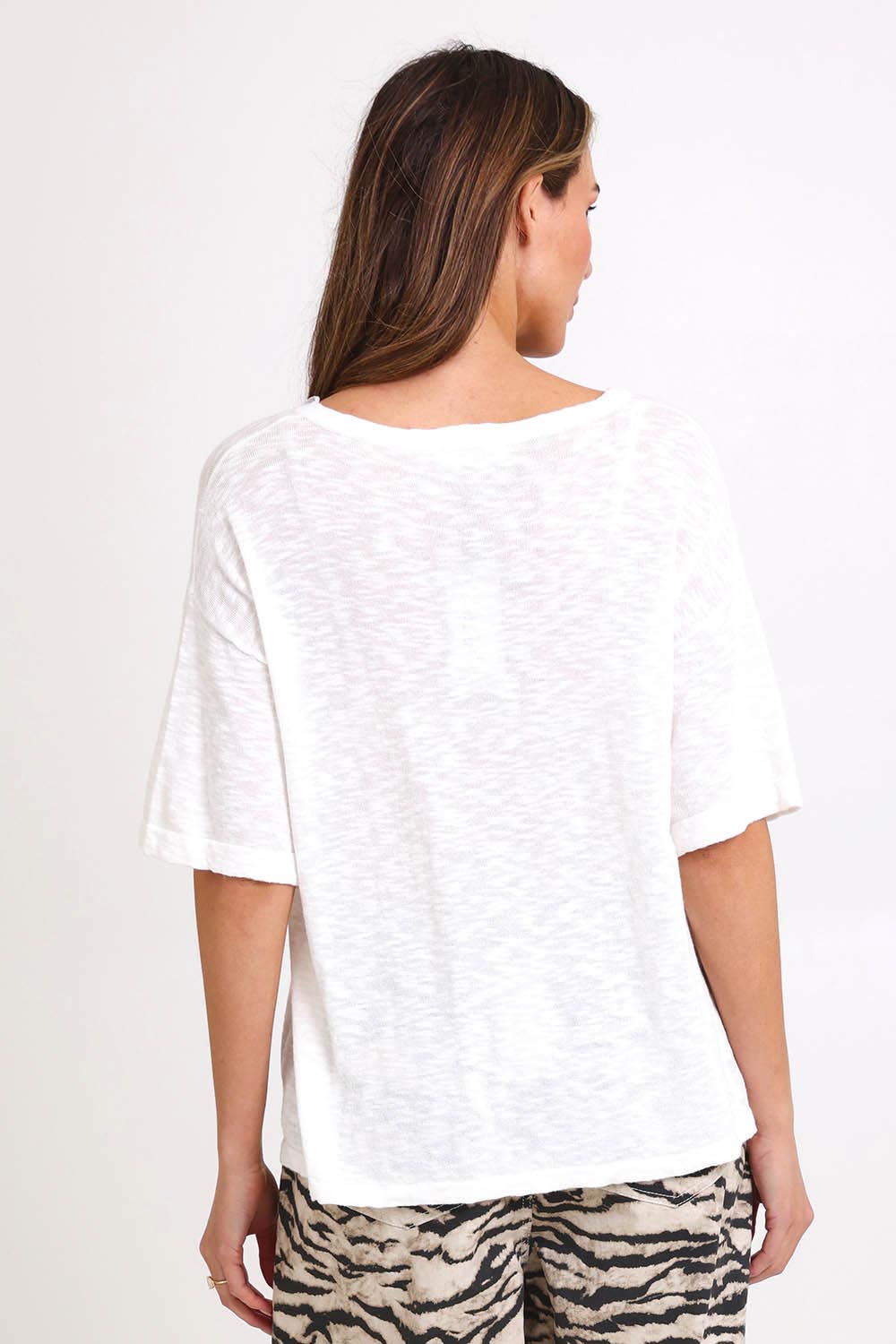 Model Madelinec wearing size 10 of the Aries V-Neck Sweater – White in colour White, from the back