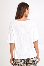 Model Madelinec wearing size 10 of the Aries V-Neck Sweater – White in colour White, from the back