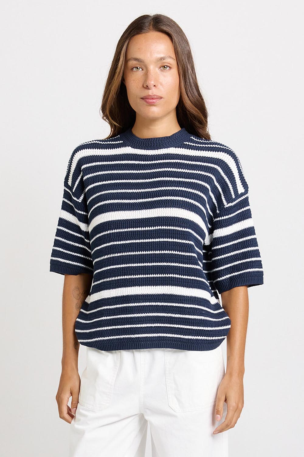 Model Genericm wearing size sample of the Dylan Knit Tee – Navywhite in colour Navywhite, in a cropped view