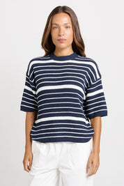 Model Genericm wearing size sample of the Dylan Knit Tee – Navywhite in colour Navywhite, in a cropped view