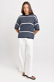 Model Genericm wearing size sample of the Dylan Knit Tee – Navywhite in colour Navywhite, from the front