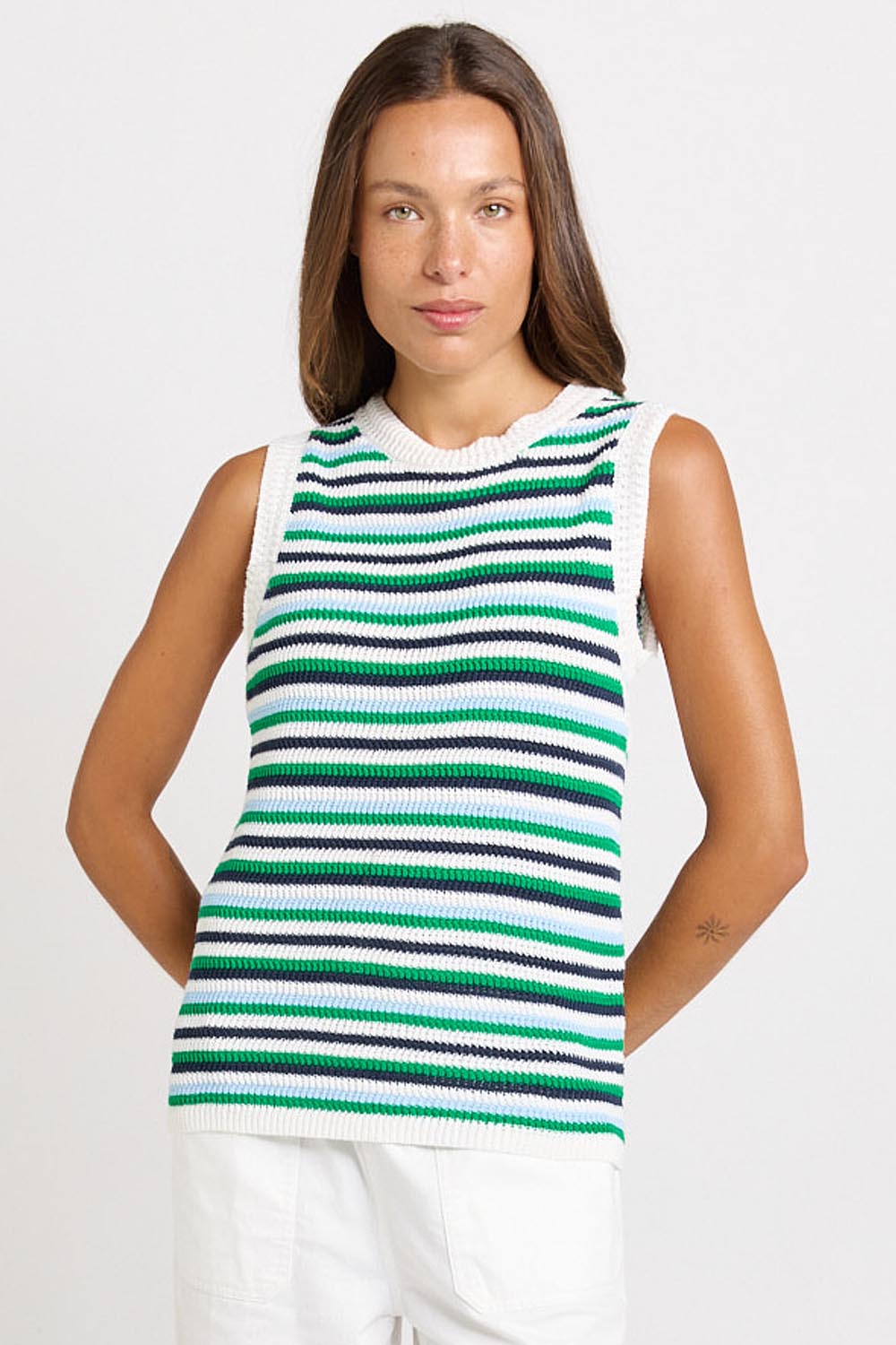 Model Genericm wearing size sample of the Roni Tank – Bluegreen in colour Bluegreen, in a cropped view