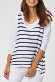 Model Cara wearing size 10 of the Jamie Tank in colour Whiteindi (White), from the front, cropped image