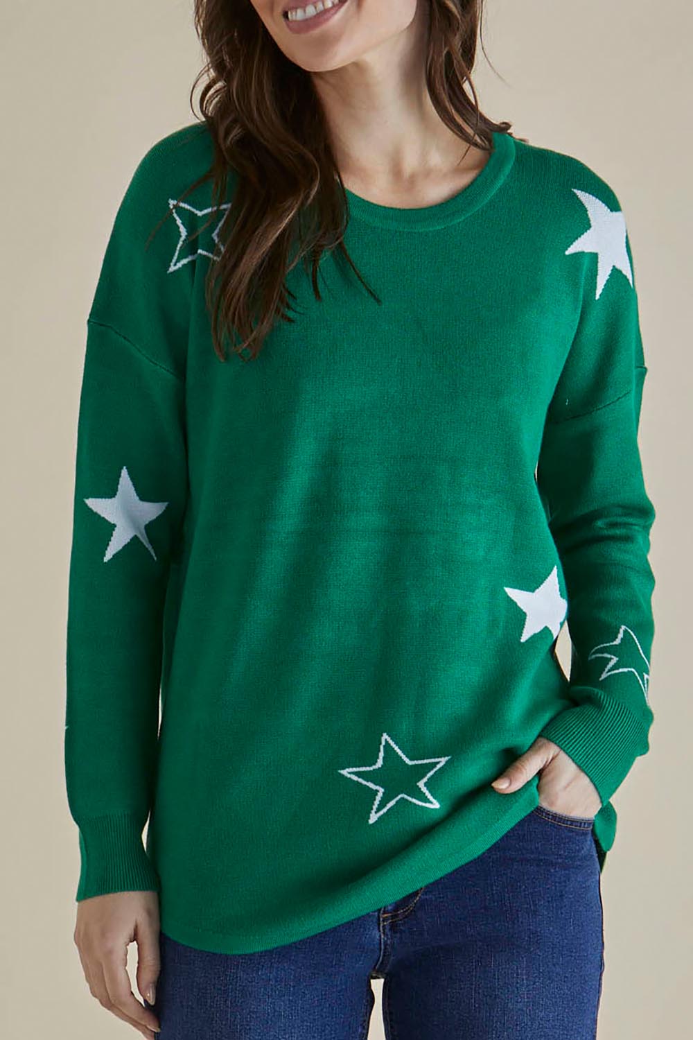 A model wearing the Sophie Knit Jumper in colour Greenstar (Green), from the front, cropped image