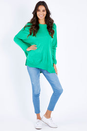 Model Vitoria wearing size S of the Macy Knit Jumper in colour Apple (Green), from the front, showing the whole outfit