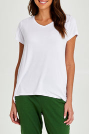 Model Madeline wearing size 10 of the Matilda Tee in colour White (White), from the front, cropped image