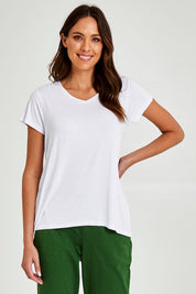 Model Madeline wearing size 10 of the Matilda Tee in colour White (White), from the front, cropped image