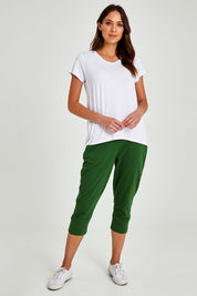 Model Madeline wearing size 10 of the Matilda Tee in colour White (White), from the front, showing the whole outfit