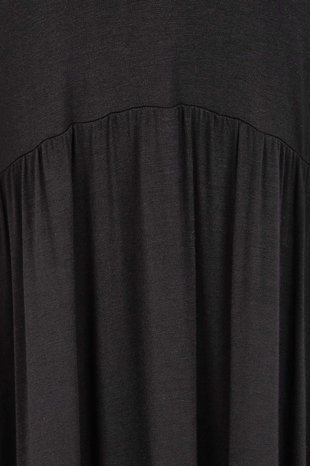 Product shot of the Donna Dress - Black in colour Black, showing detail