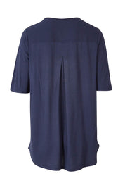 Product shot of the Maya Tee in colour Dustyblue (Blue), from the back