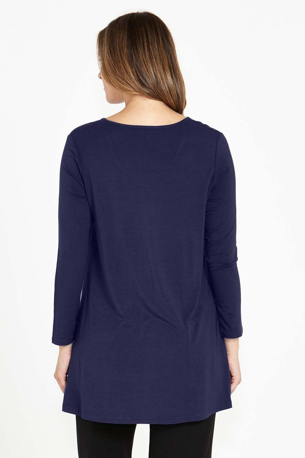 A model wearing the Cairo Tunic Bamboo Top in colour Navy (Blue), from the back