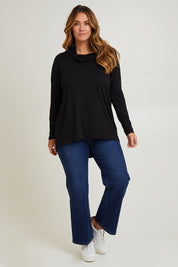 Model Laura wearing size 14 of the Cowl Bamboo Top in colour Black (Black), from the front, showing the whole outfit